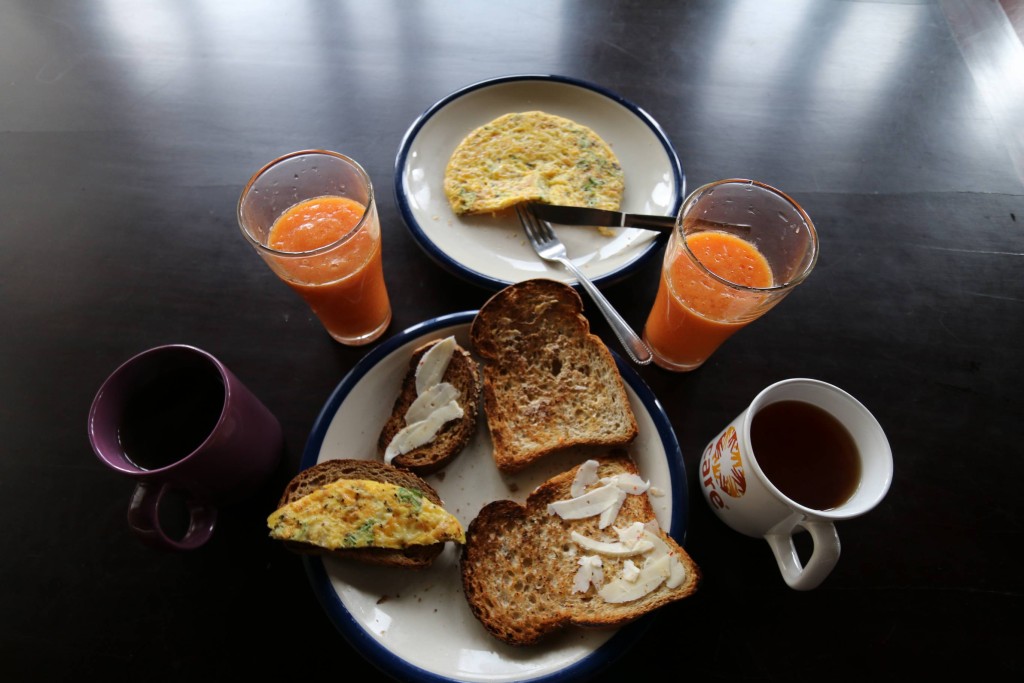 A bit more hearty breakfast - sri lanka style masala omelet, toast, fresh juice and tea & coffee