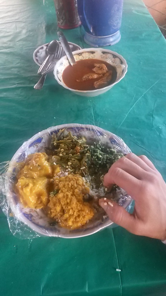 A rice and curry on a road side diner. Basic price gives you the selection of few veg curries and on top you can buy "add-ons" like the fish curry we have on separate plate. Tasty and cheap.